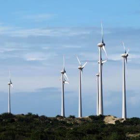 A collection of wind turbines making an impact on the environment.