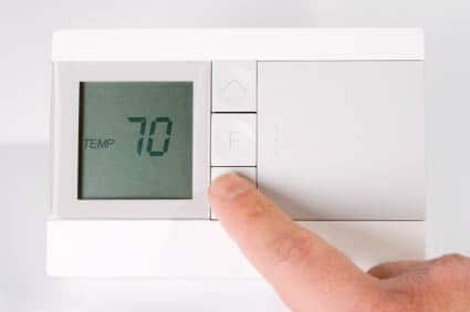 A thermostat been programmed to conserve energy.