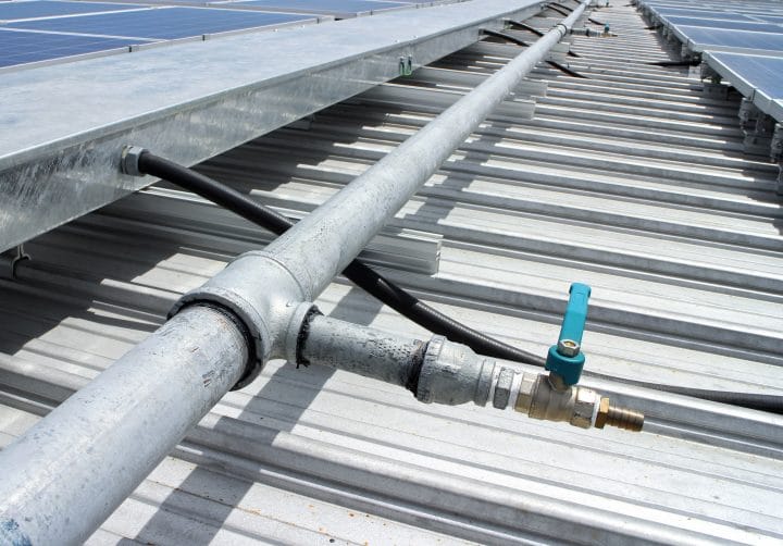 A water supply installed as part of a solar panel installation.