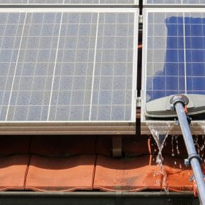 Somebody cleaning solar panels.