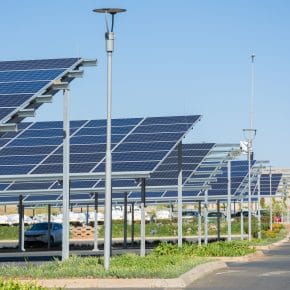 A solar panel canopy over a car park.